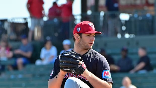 Feb 29, 2024; Tempe, Arizona, USA; Cleveland Guardians starting pitcher Gavin Williams (32) throws in the first inning against the Los Angeles Angels during a spring training game at Tempe Diablo Stadium. Mandatory Credit: Matt Kartozian-USA TODAY Sports
